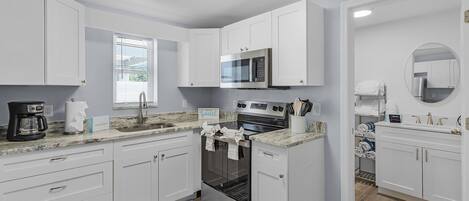 Rumah, 4 kamar tidur | Dapur pribadi | Lemari es, oven, mesin pembuat kopi/teh, dan pemanggang roti