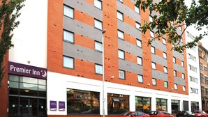 A multi-story hotel with a brick facade, large windows, and a visible Premier Inn sign. - Premier Inn Belfast City Centre Alfred St (Belfast)