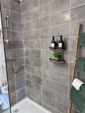 Hair dryer, towels, soap, shampoo