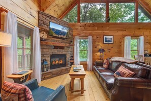 Älytelevisio, takka, videopelejä, pöytäjalkapallopöytä