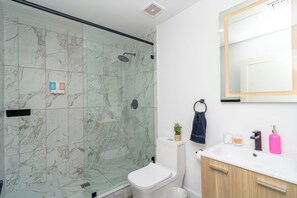 Shower, hair dryer, towels, soap