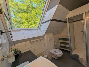 Shower, hair dryer, towels, soap