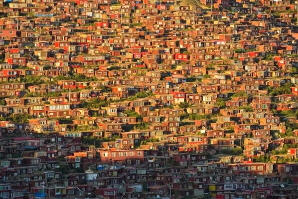 A densely packed urban area with numerous buildings closely situated together.