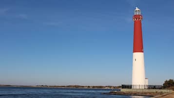 On the beach, sun loungers, beach umbrellas