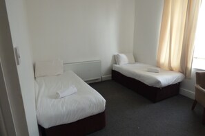 Eenvoudige Twin kamer | Gratis wifi, beddengoed