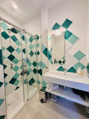 Hair dryer, bidet, towels, soap