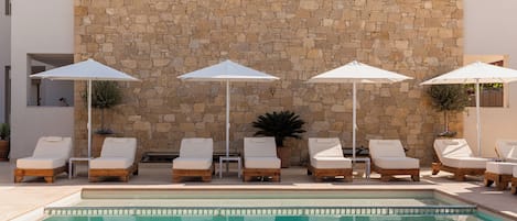 Seasonal outdoor pool, pool umbrellas, sun loungers