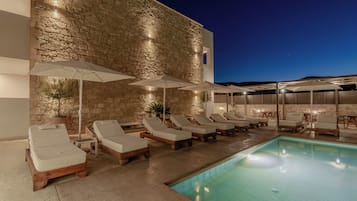 Seasonal outdoor pool, pool umbrellas, sun loungers