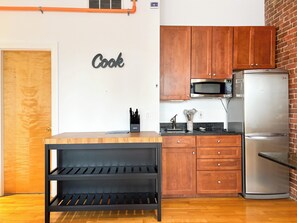 Fridge, microwave, stovetop, coffee/tea maker