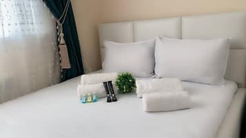 Standard Double Room, City View | Blackout drapes, iron/ironing board, free WiFi