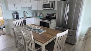 Coffee/tea maker, fridge, microwave, stovetop