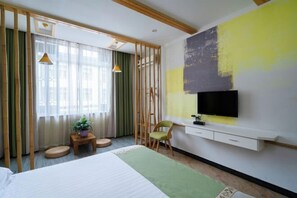 A hotel room with a bed, a desk, a chair, a TV, and a large window with curtains. - Water Village Xiaozhu (Wuzhen Xizha Scenic Area) (Tongxiang)