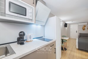 Fridge, microwave, coffee/tea maker, electric kettle