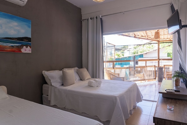 Quarto triplo conforto, vista para a cidade | Wi-Fi de cortesia