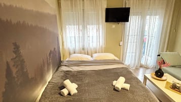 1 habitación, tabla de planchar con plancha, wifi y ropa de cama