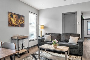 Premier Apartment, 3 Bedrooms, 2 Bathrooms | Living area | 36-inch Smart TV with digital channels, streaming services - New Orleans Bywater Apartments (New Orleans)