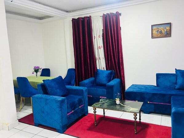 Comfort Triple Room, Bay View | Living area