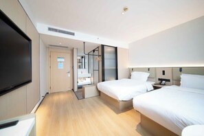 A modern hotel room with two beds, a flat-screen TV, a desk, and a walk-in closet. - Charlotte Boutique Hotel (Shanghai Zhoupu Wanda) (Shanghai)