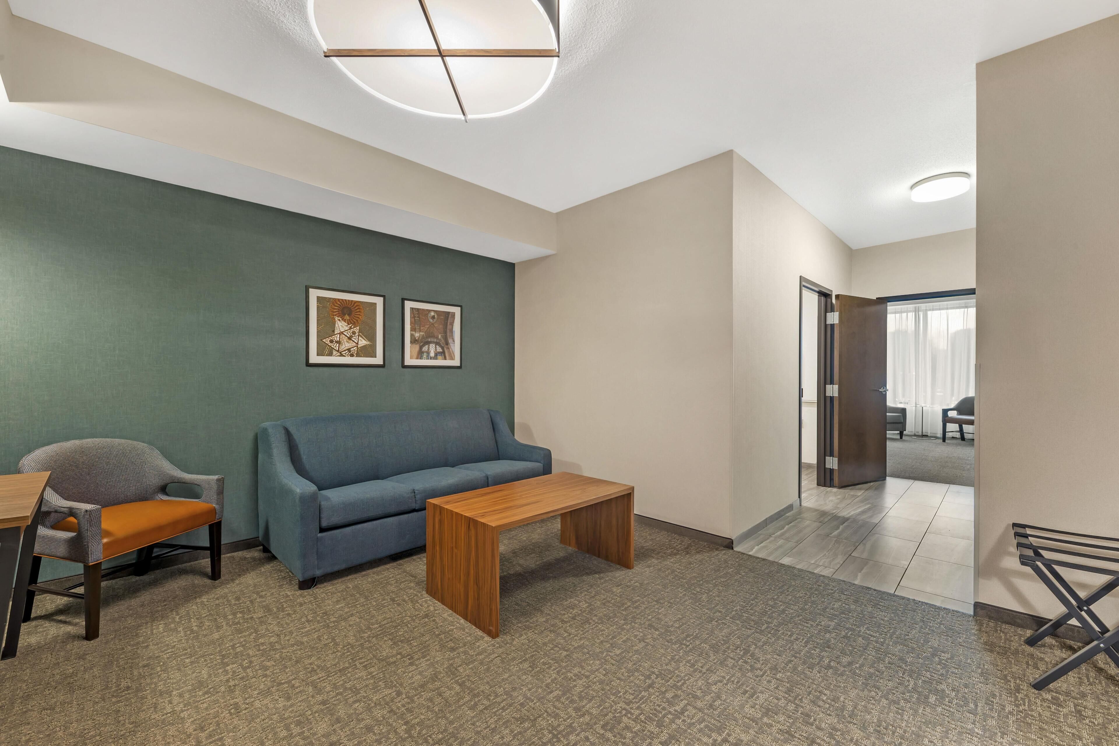 Suite, 1 King Bed with Sofa bed, Accessible, Bathtub (2 Rooms) | Blackout drapes, iron/ironing board, rollaway beds, bed sheets