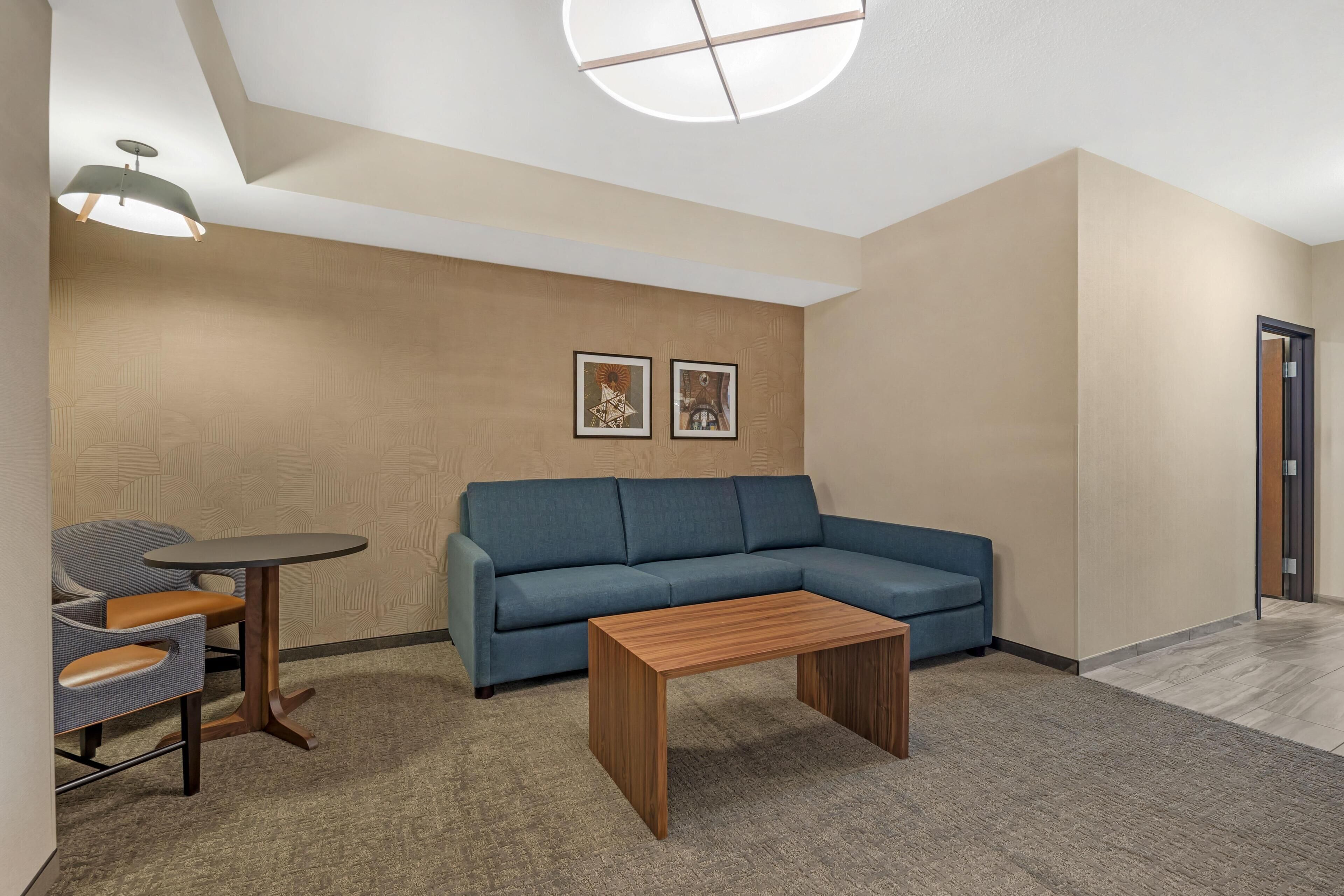 Suite, 1 King Bed with Sofa bed, Refrigerator & Microwave (2 Rooms, Upper Floor) | Blackout drapes, iron/ironing board, rollaway beds, bed sheets