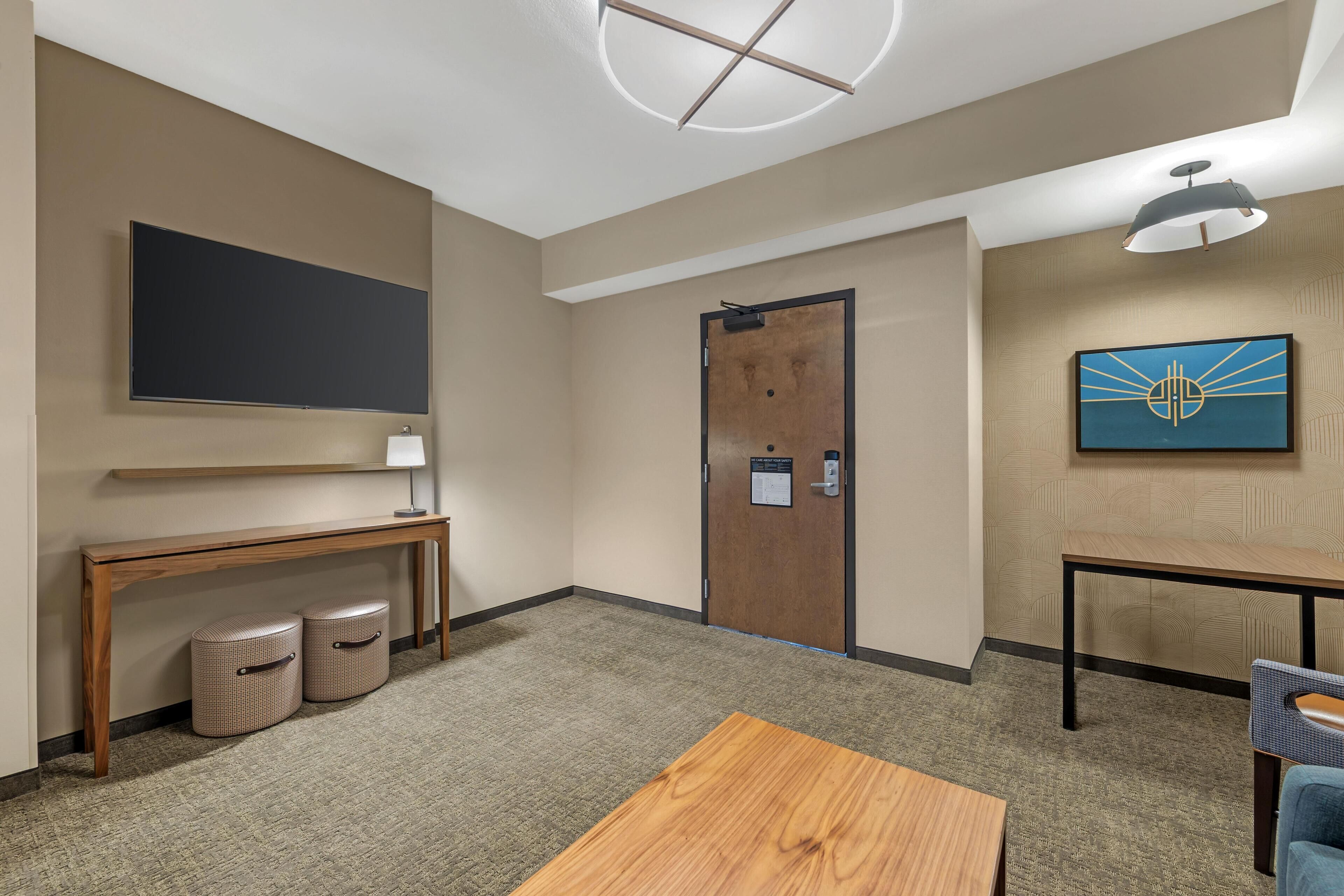 Suite, 1 King Bed with Sofa bed, Accessible, Refrigerator & Microwave (2 Rooms, Roll-in Shower) | Blackout drapes, iron/ironing board, rollaway beds, bed sheets