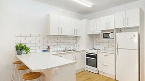 Fridge, microwave, oven, cookware/dishes/utensils