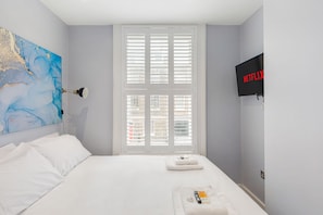 1 chambre, fer et planche à repasser, Wi-Fi gratuit, draps fournis