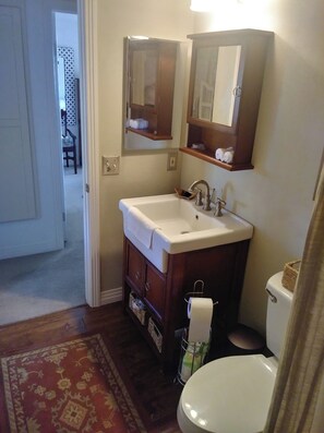 Shower, towels, soap, toilet paper