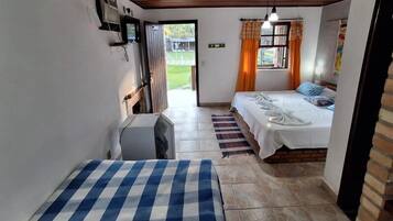 Habitación triple Confort | Ropa de cama