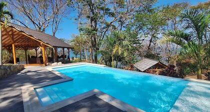 BEACH RESORT PLAYA LEONA - Family Bungalow with air conditioning and pool view.