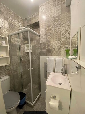 Shower, towels, soap, toilet paper