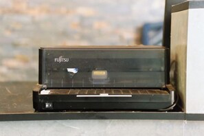 A Fujitsu laptop on a tiled surface. - Zhangjiajie Ancient and Modern Inn (Zhangjiajie)