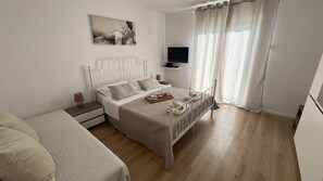 2 habitaciones, tabla de planchar con plancha, internet y ropa de cama 