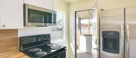 Fridge, microwave, stovetop, coffee/tea maker