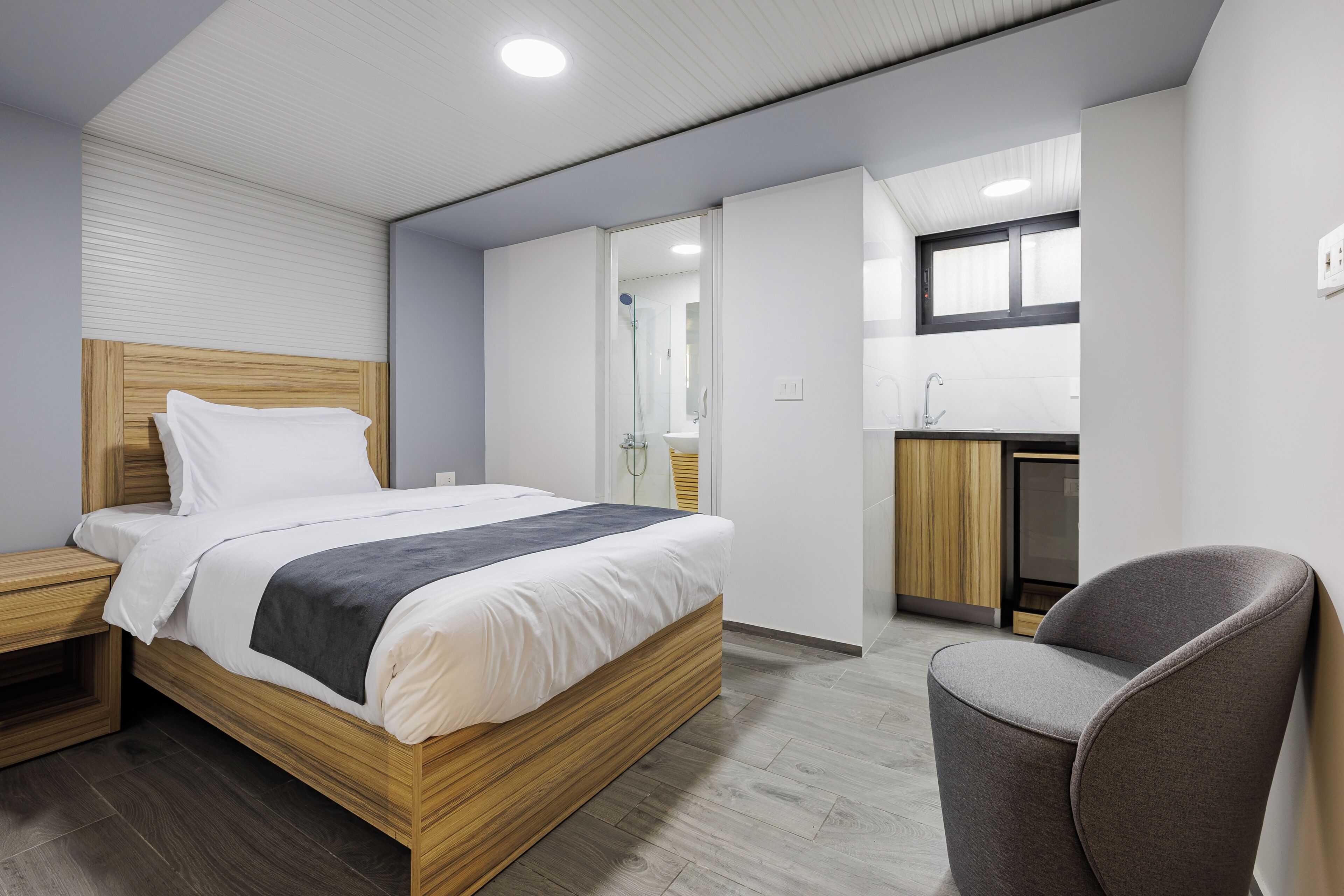 Chambre Simple Économique, 1 lit une place | Coffres-forts dans les chambres, rideaux occultants