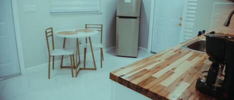 Fridge, microwave, coffee/tea maker, toaster