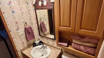 Shower, towels, soap, shampoo