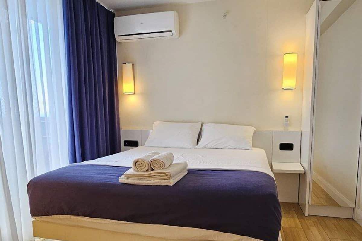 Habitación triple Confort | Tabla de planchar con plancha y wifi gratis
