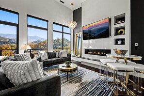 Smart TV, fireplace, foosball, books