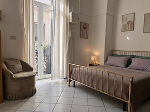 1 bedroom, desk, iron/ironing board, travel cot