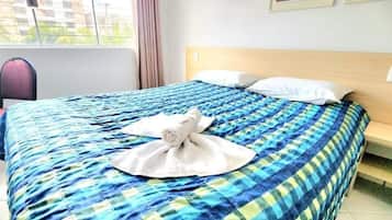 Quarto duplo superior | Frigobar, cortinas blackout, Wi-Fi de cortesia, roupa de cama