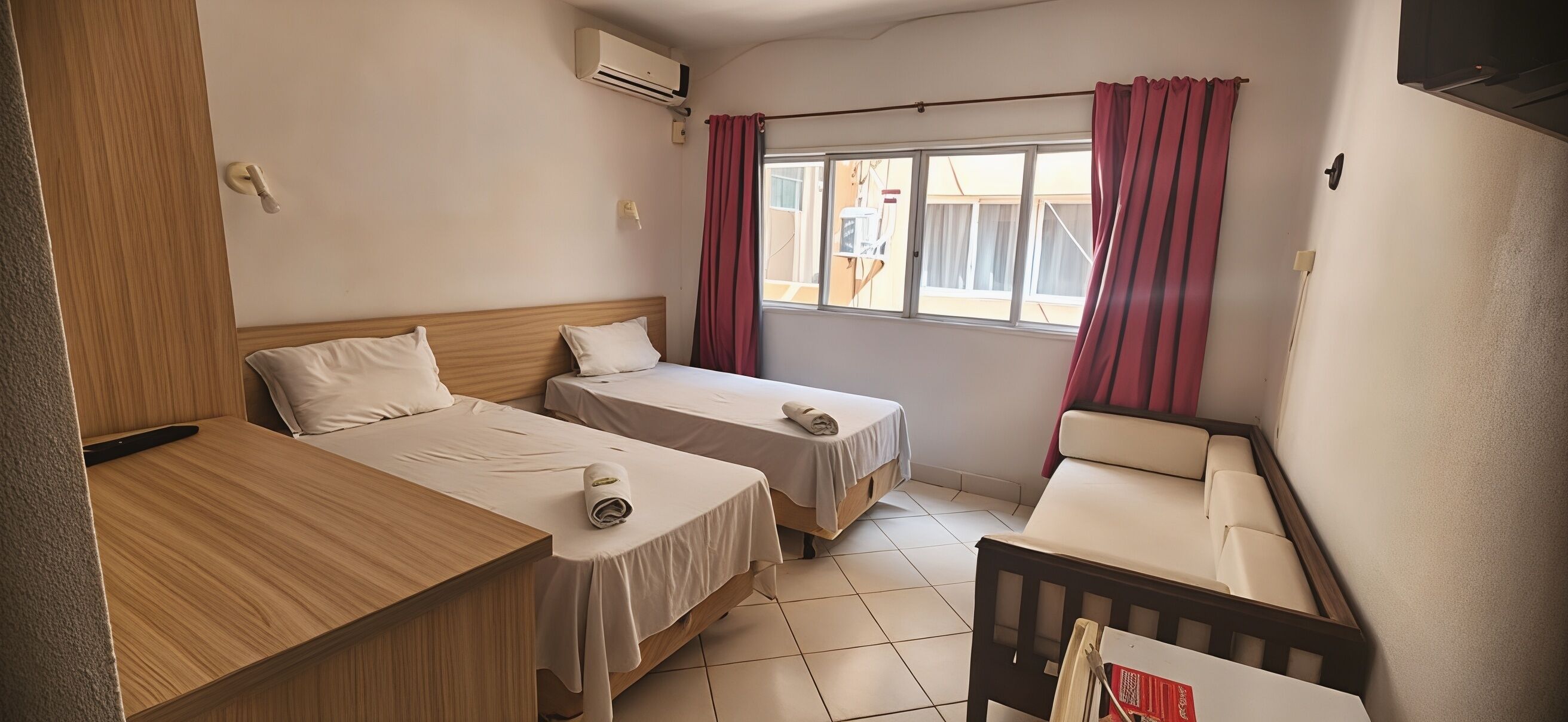 Economy Twin Room | Minibar, blackout drapes, free WiFi, bed sheets