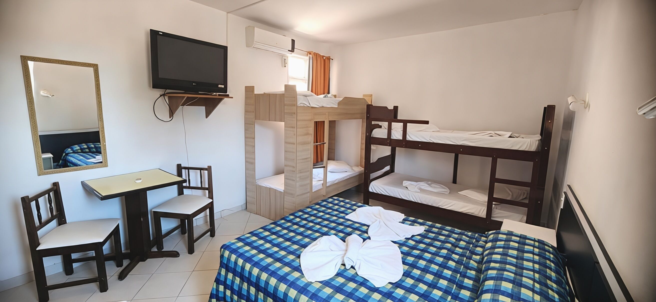 Economy Room | Minibar, blackout drapes, free WiFi, bed sheets