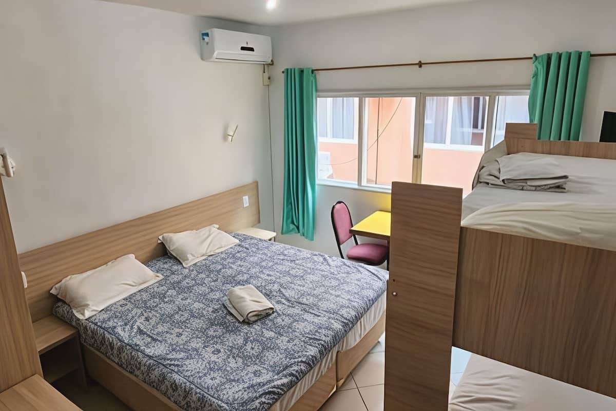 Economy Quadruple Room | Minibar, blackout drapes, free WiFi, bed sheets