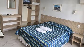 Quarto duplo premium | Frigobar, cortinas blackout, Wi-Fi de cortesia, roupa de cama