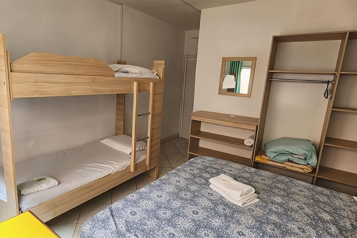 Economy Quadruple Room | Minibar, blackout curtains, free WiFi, bed sheets