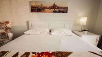 Classic Suite, Beach View | In-room safe, blackout curtains, soundproofing, iron/ironing board