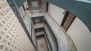 Classic Suite, Beach View | In-room safe, blackout drapes, soundproofing, iron/ironing board