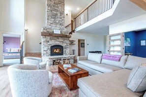 Smart TV, fireplace, foosball, books