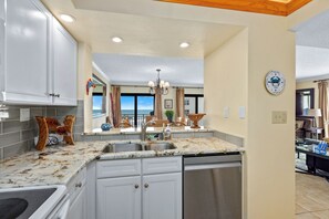 Fridge, microwave, oven, stovetop - Seascape Towers 326 | Direct Oceanfront Escape with Two Balconies, Pool & Beach Access (New Smyrna Beach)